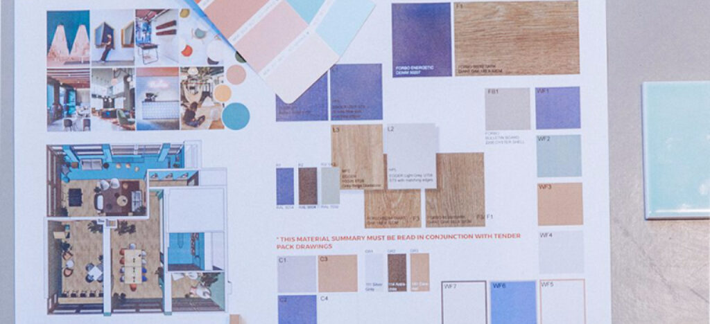 A mood board of paint and wood samples.