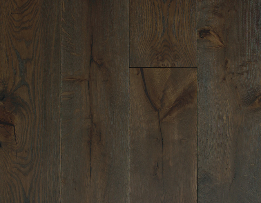 Overhead shot of chocolate brown oak plank floor with natural variation and surface texture. Engineered flooring by Broadleaf Timber.