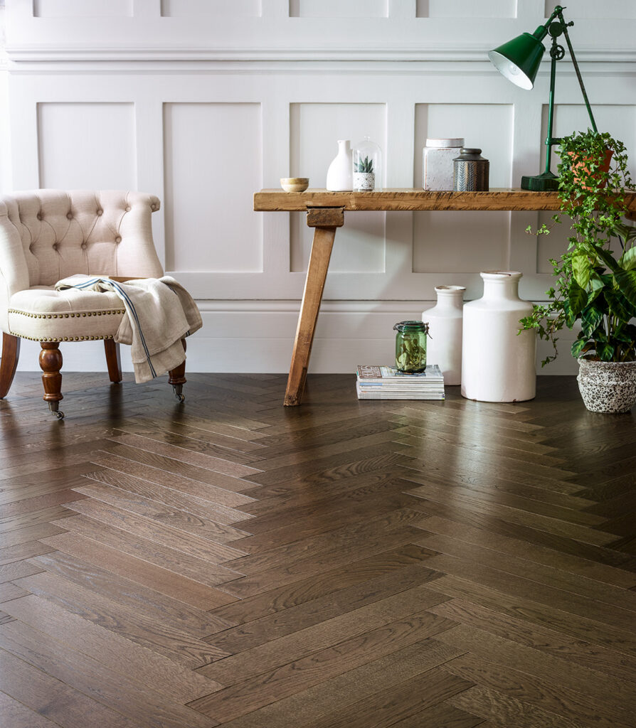 Beautiful aged solid oak herringbone parquet floor by Broadleaf Timber.