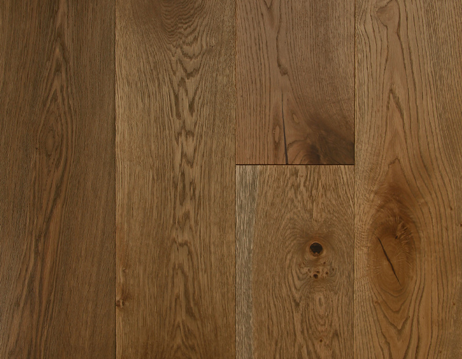 Overhead view of a natural oak plank floor with rich surface texture and natural variation.