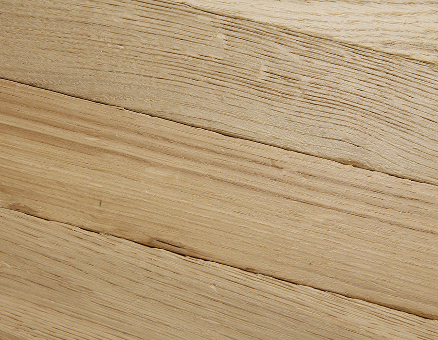 Close shot showing deep surface texture and grain of Broadleaf Timber solid wood parquet blocks in light brown oak.