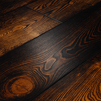 Close up of burnt effect oak wood flooring by Broadleaf Timber
