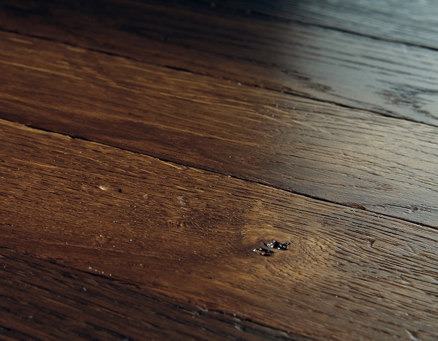 Spice-toned parquet floor with added surface texture by Broadleaf Timber.