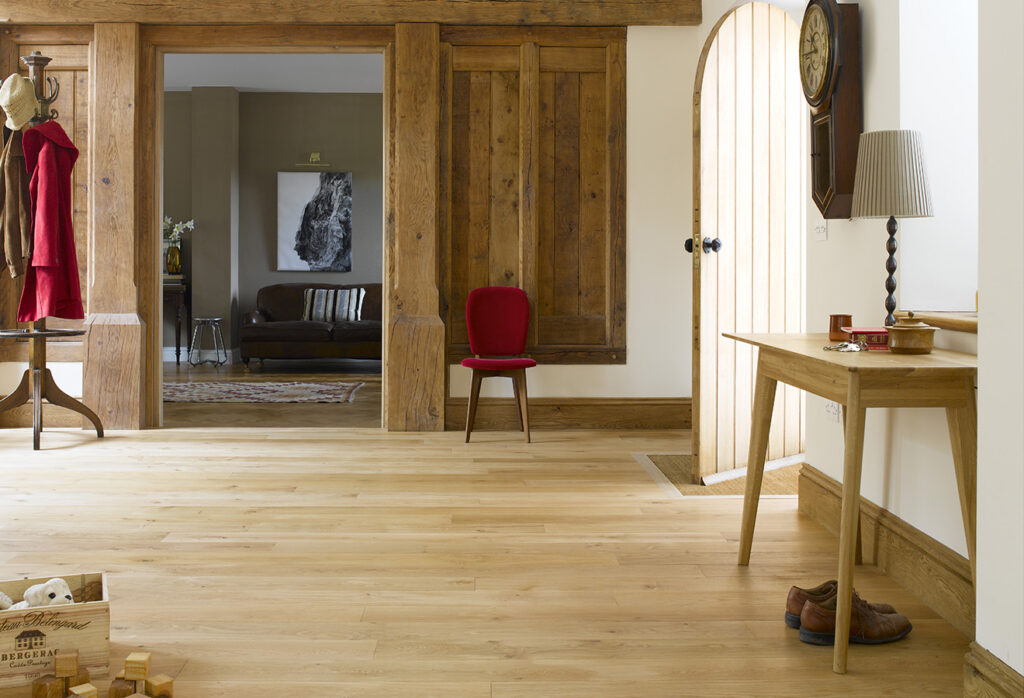 Traditional oak plank flooring by Broadleaf Timber, being used in an entranceway.