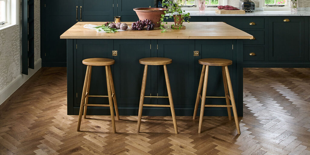 Rich vintage parquet floor in a family kitchen